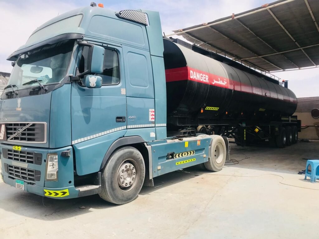 “bitumen transport UAE”, “bitumen tanker rental UAE”, “bitumen tanker rental UAE”, “bulk bitumen transportation”, “hot bitumen delivery”,“40MT bitumen road tanker”, “safe bitumen transport services”, “bitumen logistics UAE”, “bitumen transport Sharjah”, “bitumen transport Dubai”, “bitumen transport Abu Dhabi”, “bitumen transport Ajman”, “bitumen transport Ras Al Khaimah”,“bitumen transport Fujairah”, “bitumen transport Umm Al Quwain”, “Rukn Al Mizan General Transport LLC”, “Bitumen Transport companies in UAE”, “Bitumen Transporters in UAE”, “Asphalt tankers”, “Asphalt Transport UAE”, “Bitumen Drum Filling Services”, “Biggest transport company in UAE”, “Largest transport company in UAE”, “Road tanker transport”, “Bitumen road tankers”, “bitumen drum filling services in UAE”,##"Asphalt tanker rental" ##"Bitumen tanker rental" ##"Tanker rental services" ##"Heavy vehicle rental" ##”Best bitumen transport company in UAE” ##”Best bitumen transport” ##”Rent Bitumen tanker trailer 40MT” ##”Transport rental services in UAE” ##”Bitumen tanker companies” ##”Bitumen road tanker rental” ##”Asphalt road tankers services”